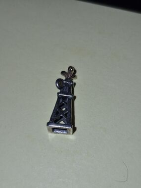 RETIRED JAMES AVERY IT'S A GUSHER CHARM